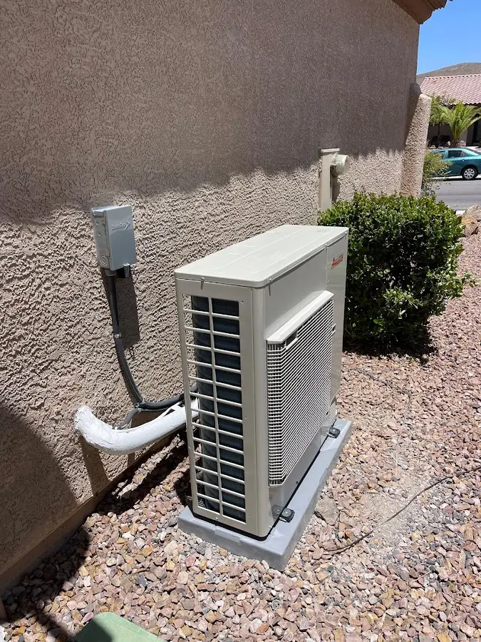 Residential air conditioning condenser unit in La Grande